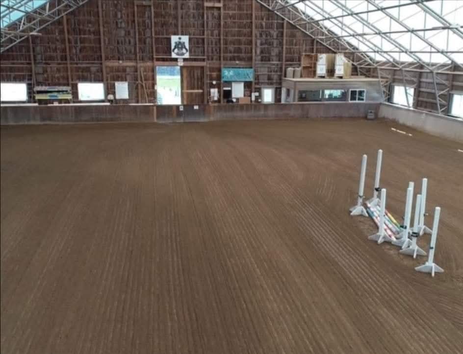 Indoor arena looking at heated viewing room and viewing deck