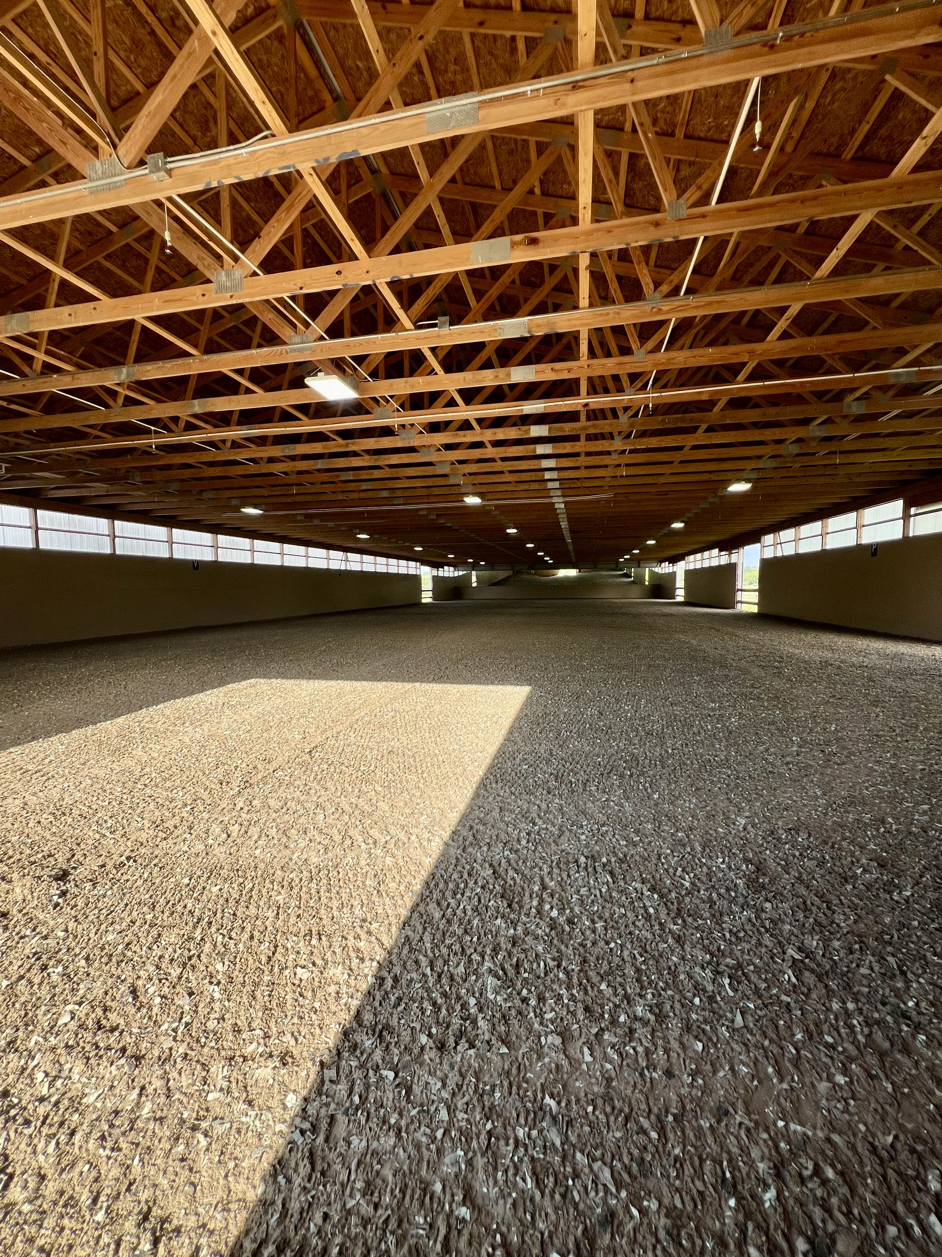 200 x 80 indoor arena with GGT footing, watered and dragged daily