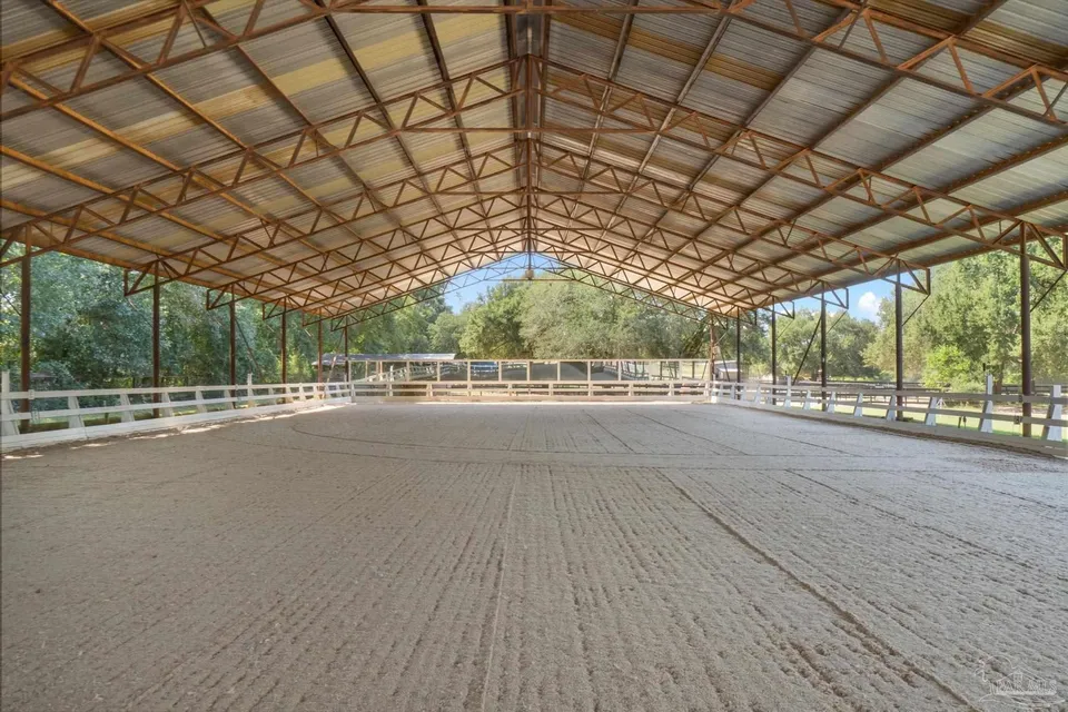 Covered arena with mirrors and angled kicking walls