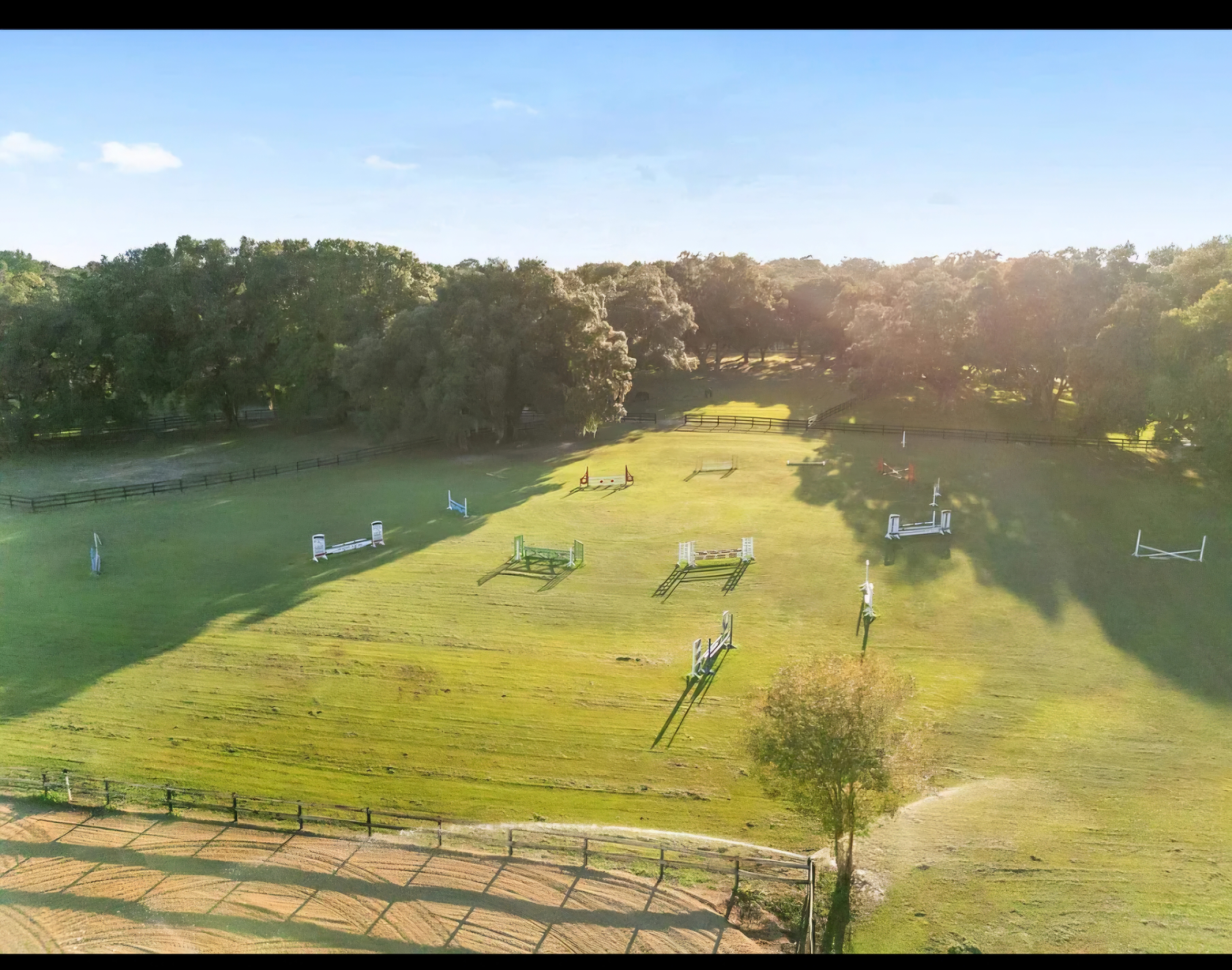 Grass jump field with cross country jumps and trails