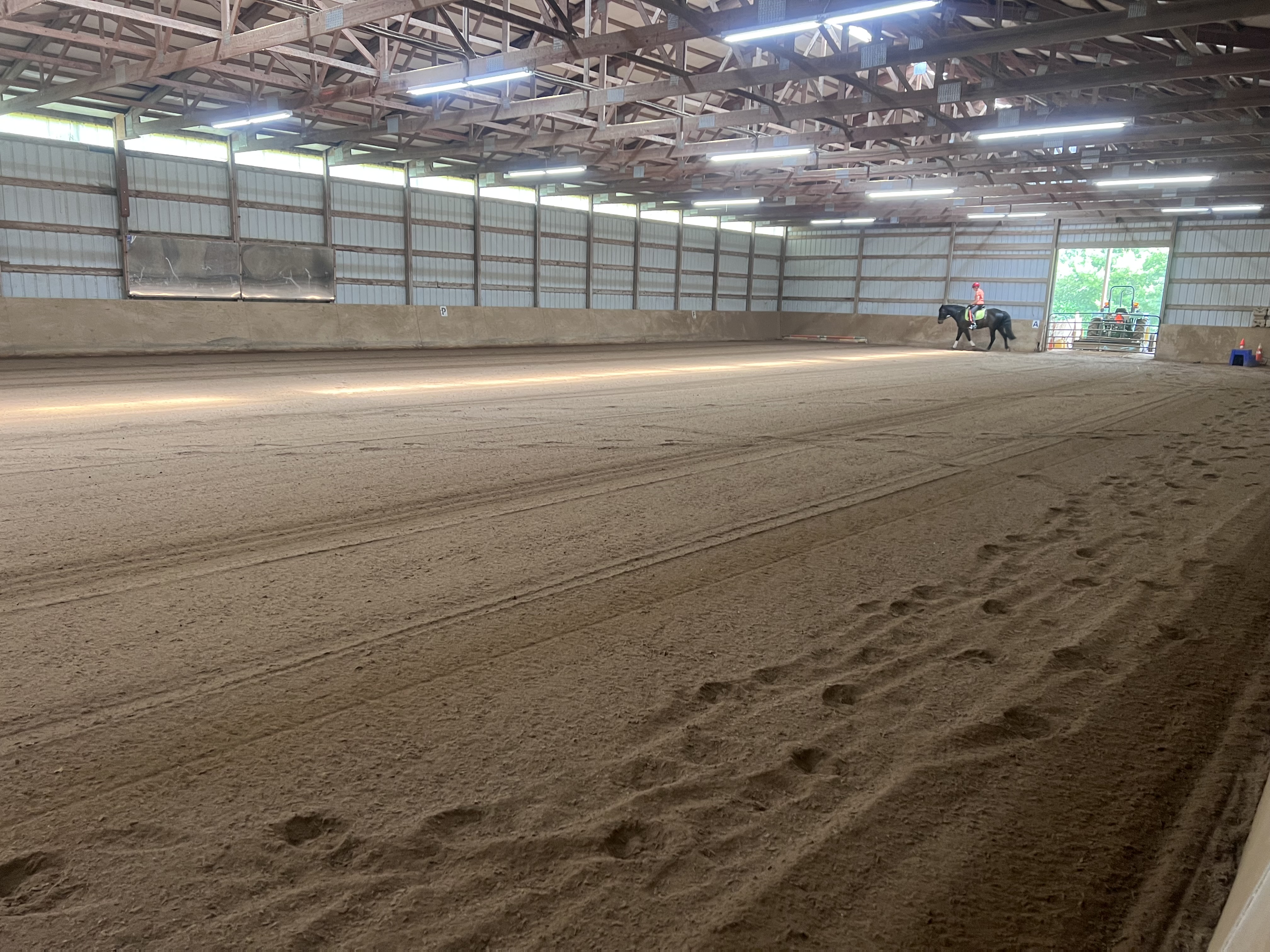 100 x 200 ft indoor arena, groomed regularly