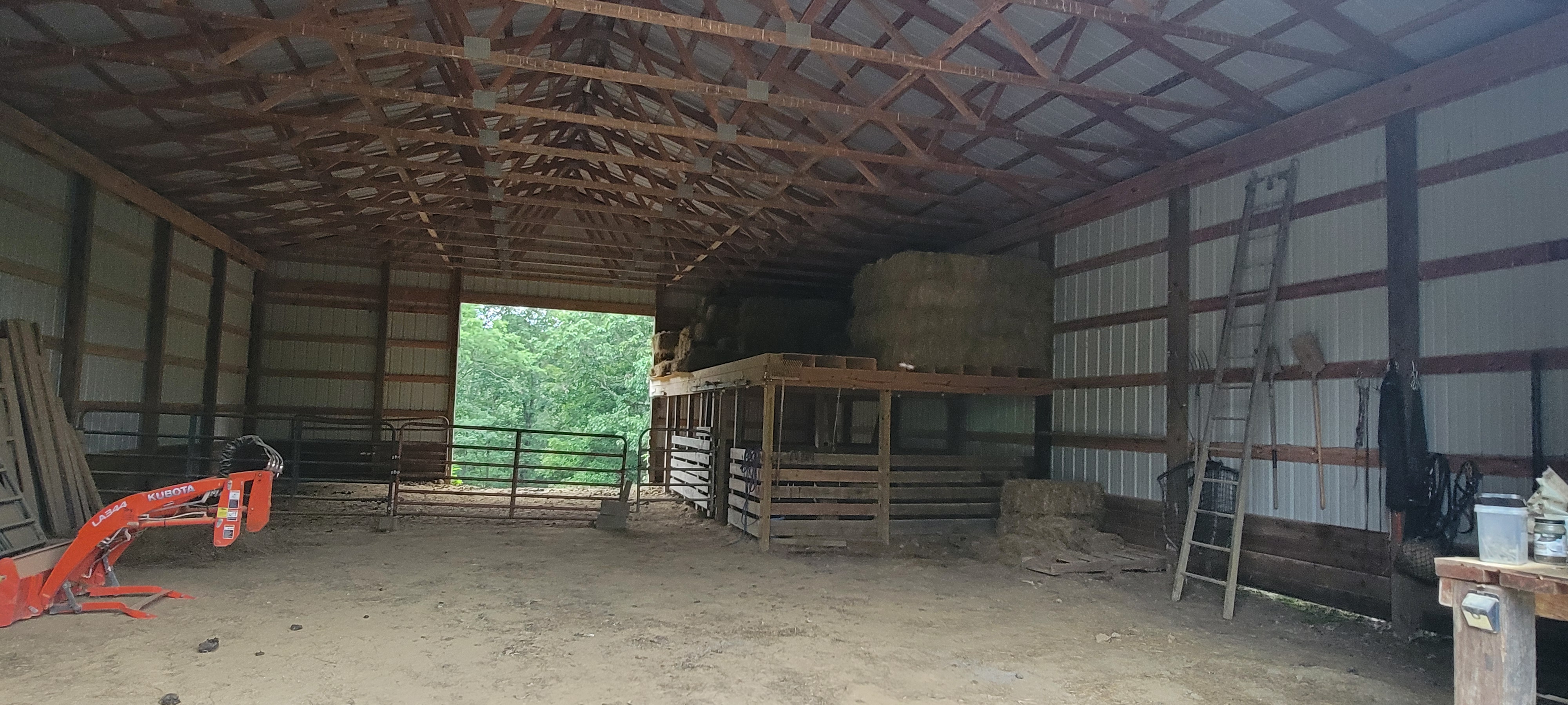 Main barn w/ run in and stalls