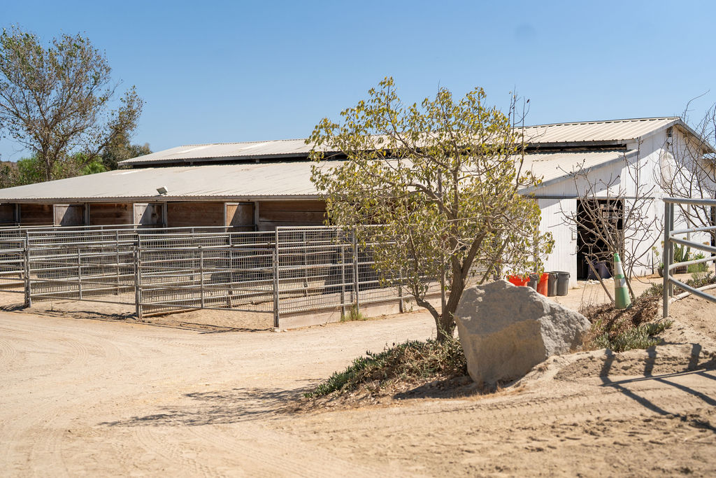Main barn with attached pipe corrals