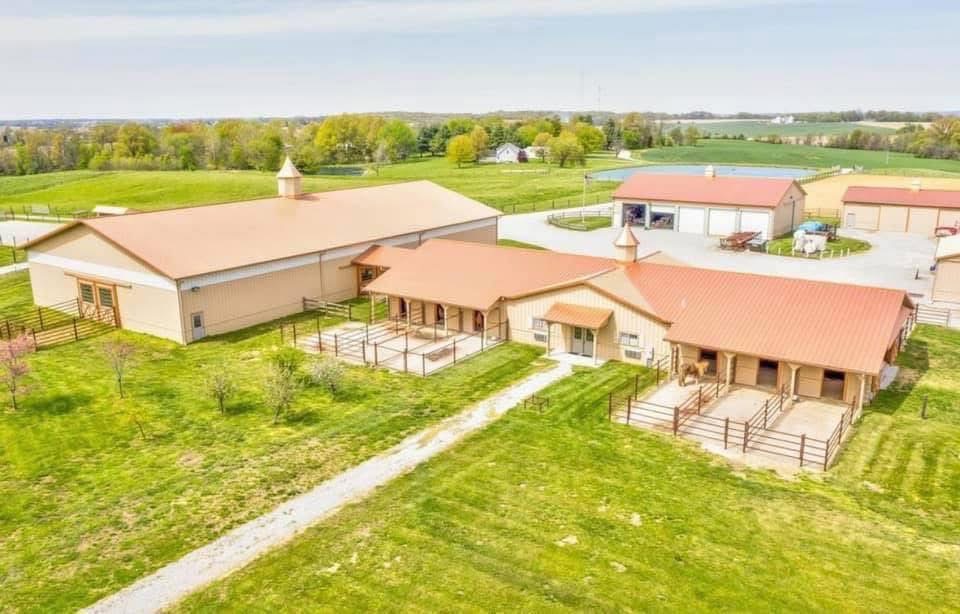 Windstar Ranch stall barn and attached indoor arena