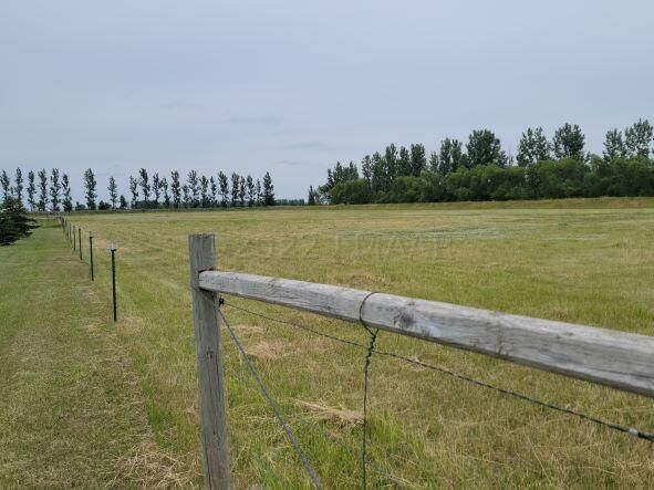 10 acres and 3 pastures